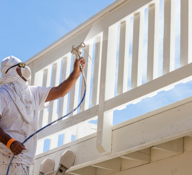 Spray Painting House