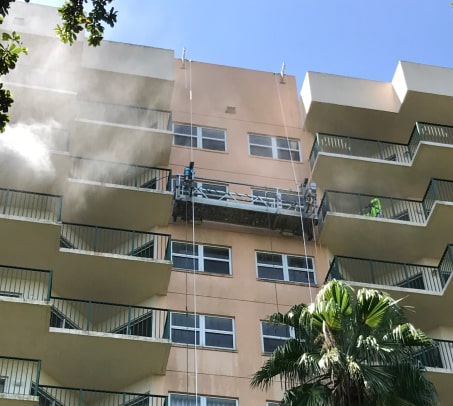 High Reach Painting Around Windows